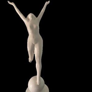 Ceramic figure woman outstretched arms. 10 inches tall.